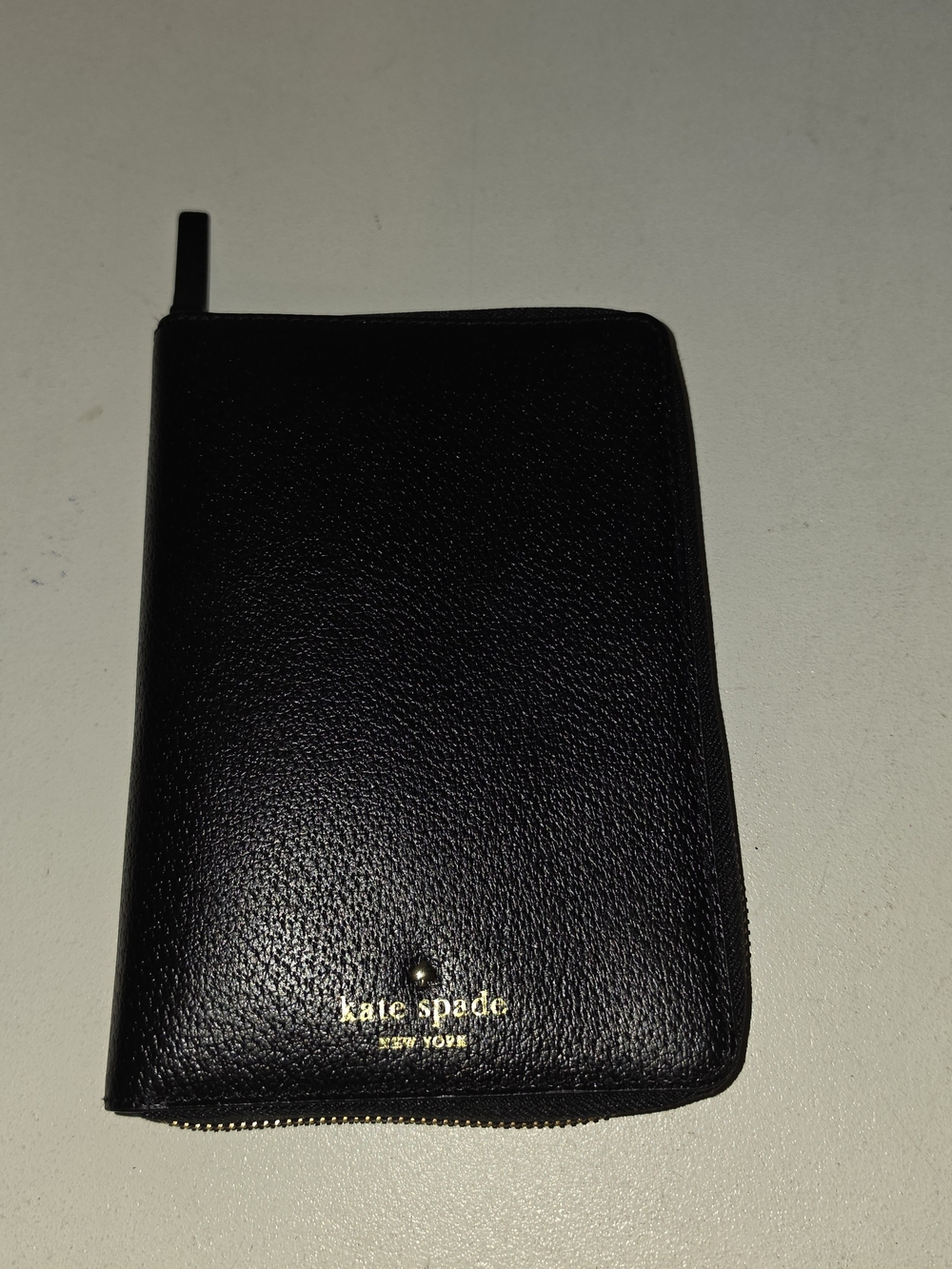black pebbled leather Kate Spade Wellesley zip-around personal organizer